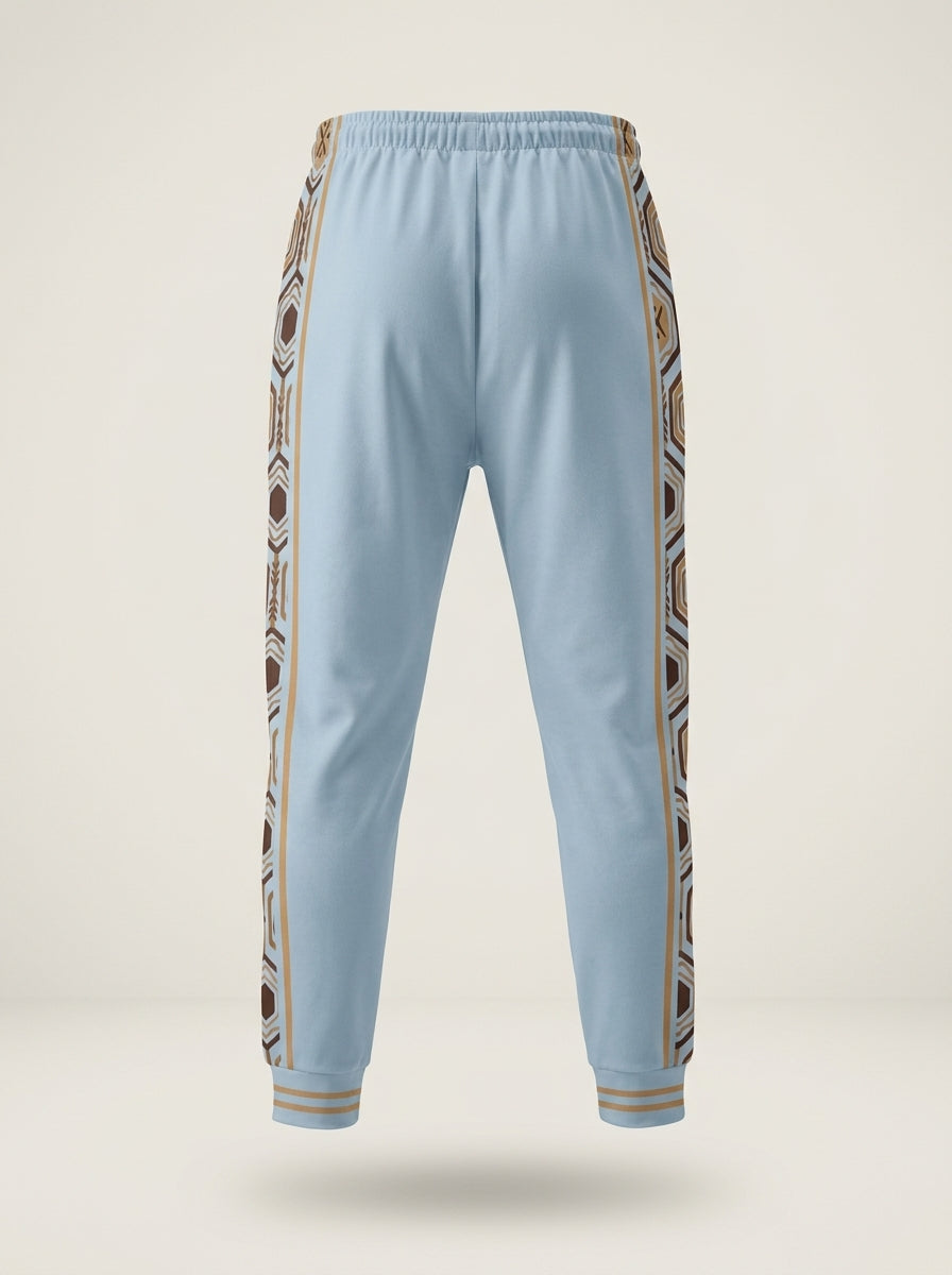 AnanseNova™ Men's Joggers in Igwe Blue, ghost mannequin back view — hexagon side panels, elastic waistband. SunBorn