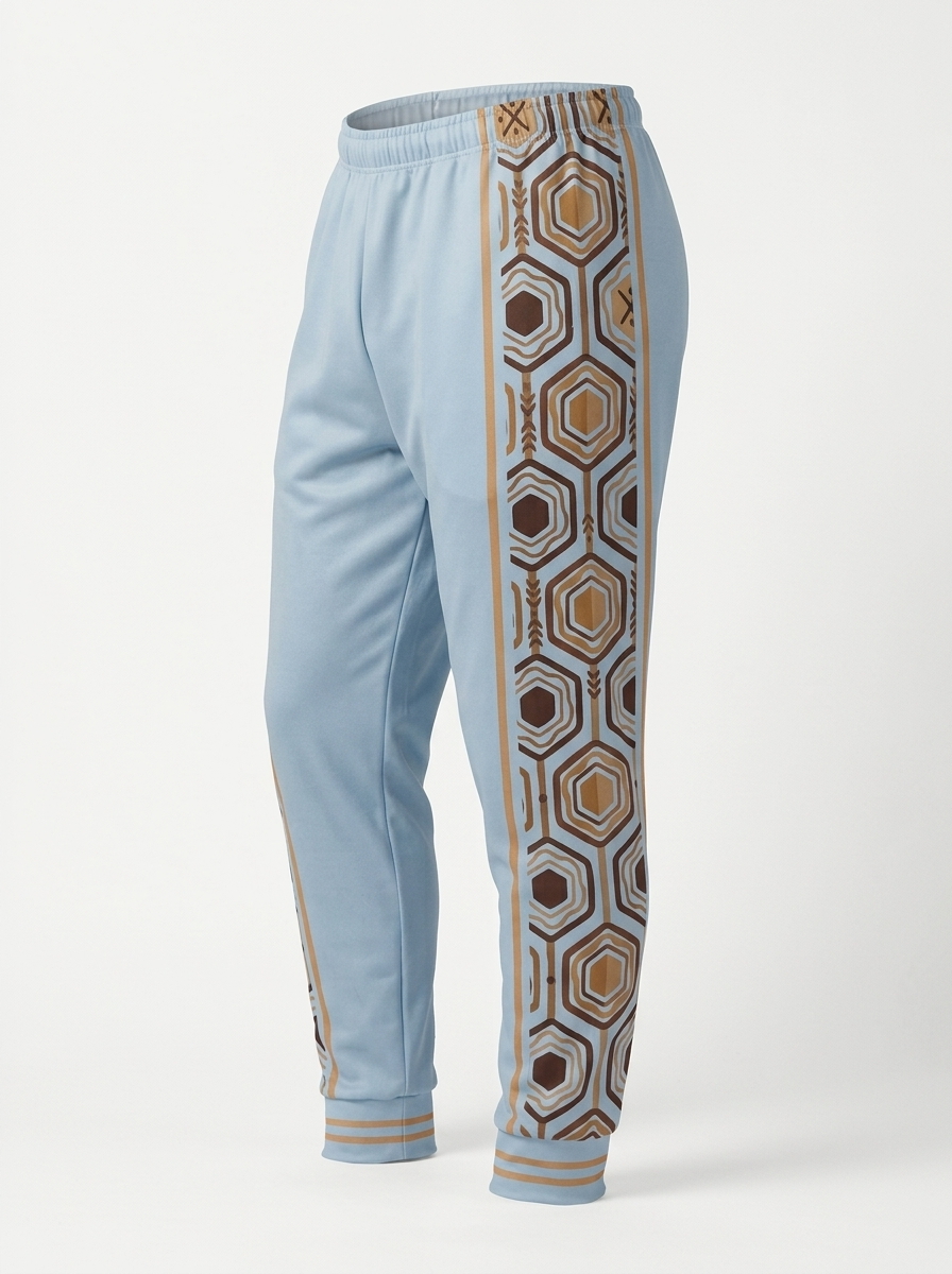 AnanseNova™ Men's Joggers in Igwe Blue, ghost mannequin three-quarter right view — tapered leg, striped ankle cuff. SunBorn