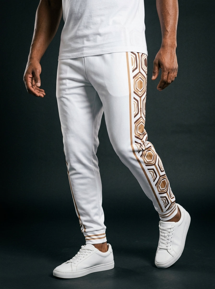AnanseNova™ Men's Joggers in Ocha White, front view on model — AnanseNova™ hexagon side-panel stripe edged in bronze pinstripes, striped ribbed ankle cuffs. SunBorn