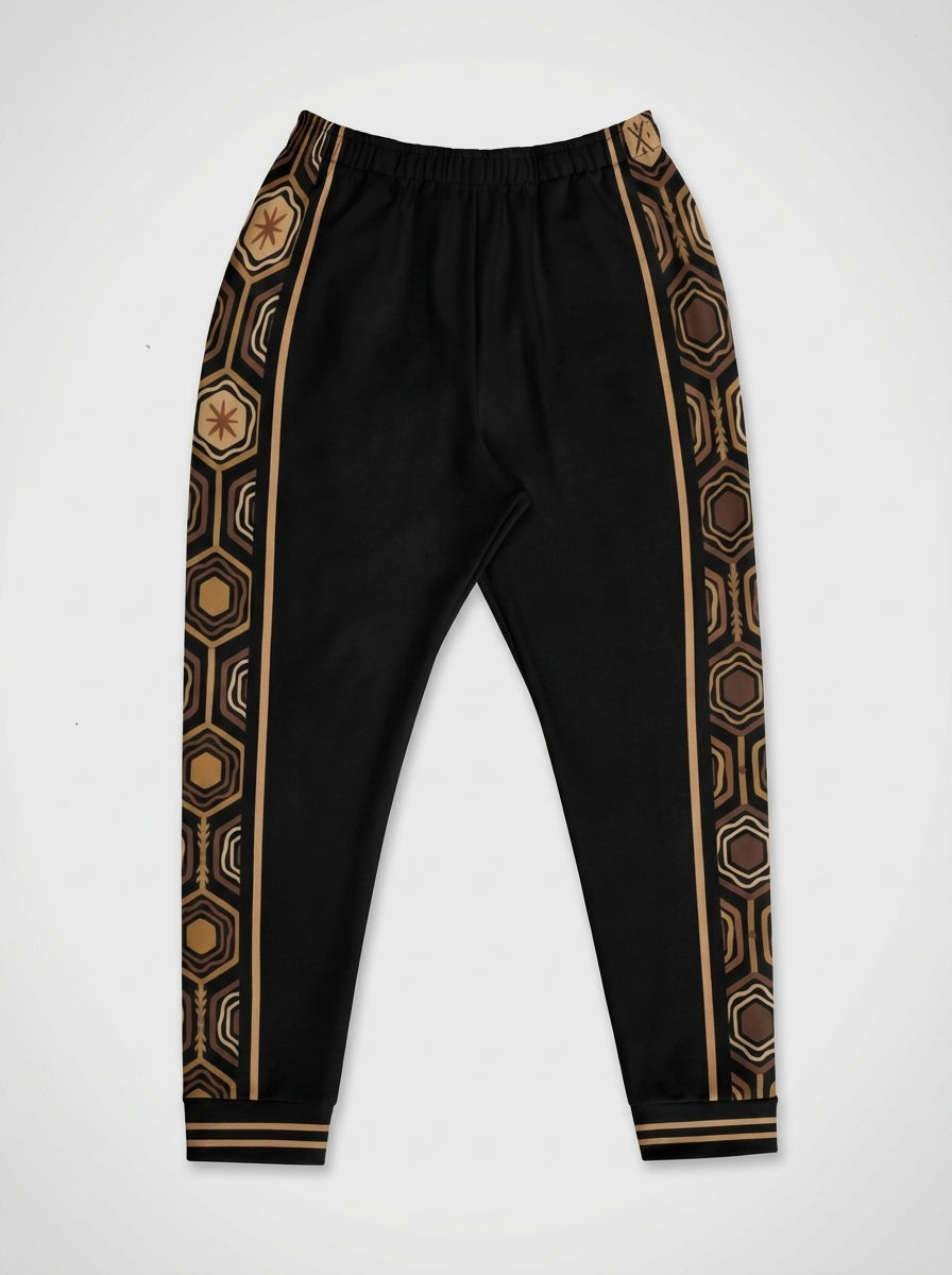 AnanseNova™ Men's Joggers in Oji Black, flat lay — hexagon side panels on both legs, elastic drawstring waistband. SunBorn