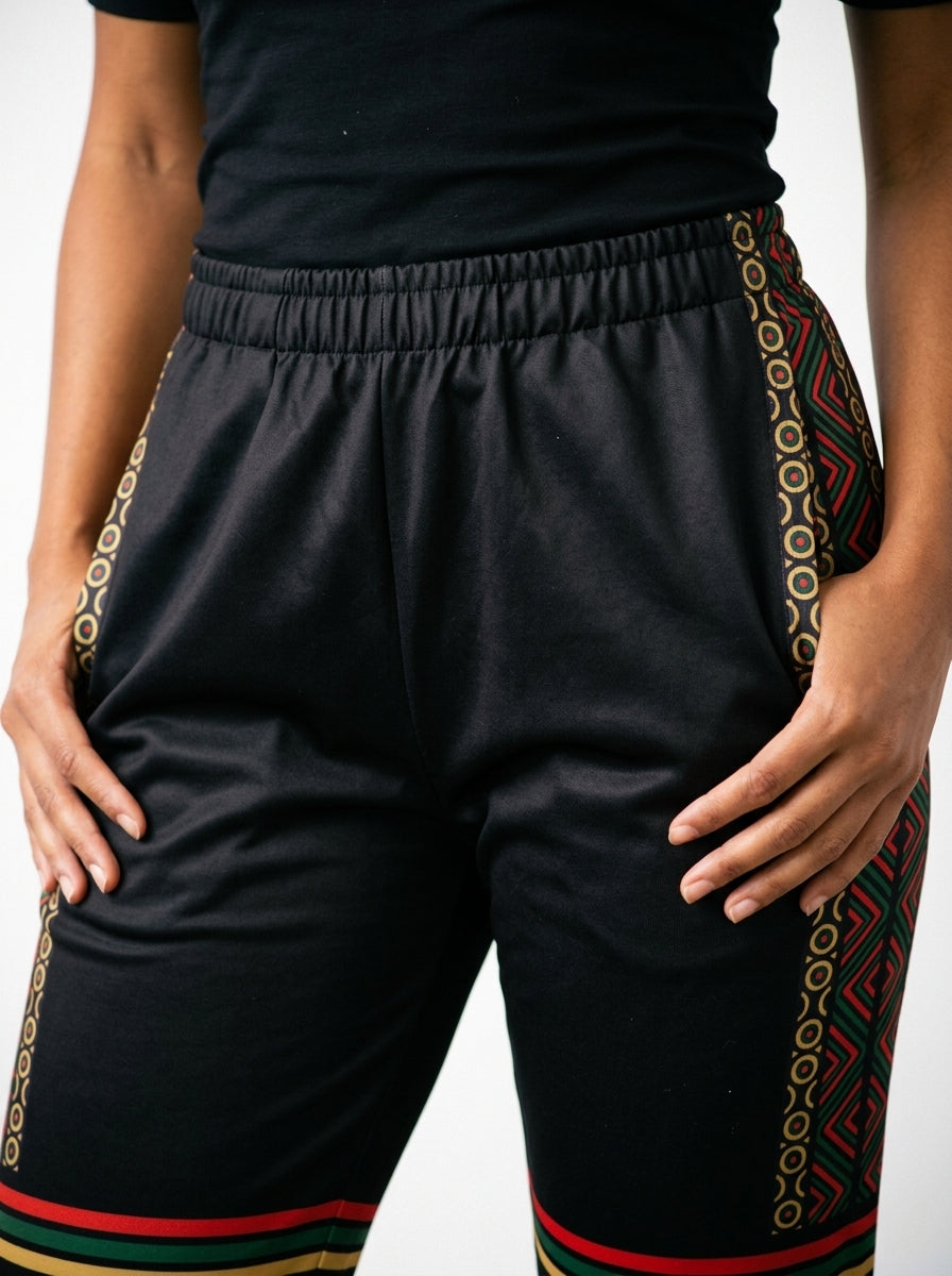 N'Donso™ Women's Joggers in Uhie Red — macro of knee band and ribbed cuff