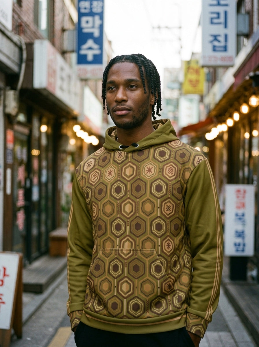 AnanseNova™ // Statement Hoodie in Ubi Green — everyday lifestyle shot — SunBorn