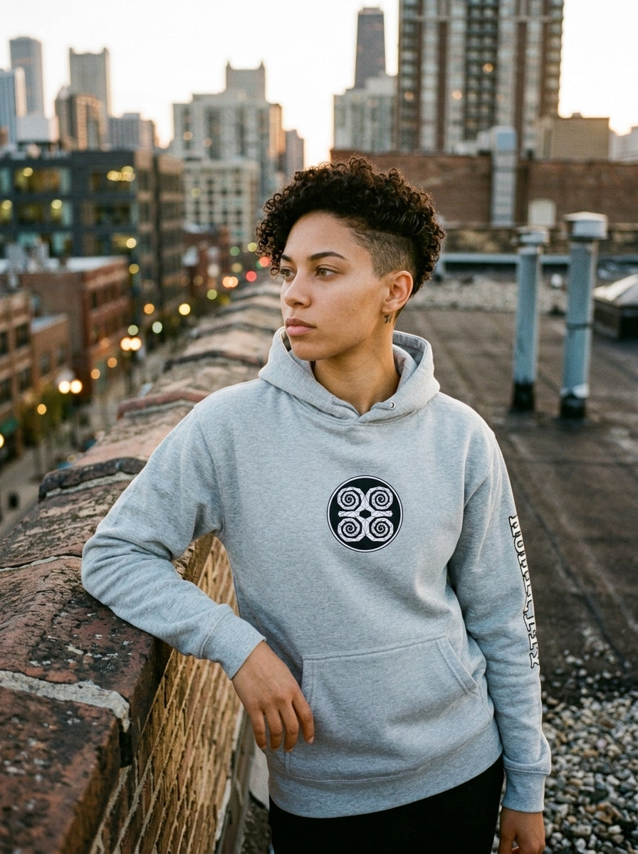 SunBorn Adinkra // Humility Hoodie in Ntụ Gray, styled in a real-world lifestyle setting