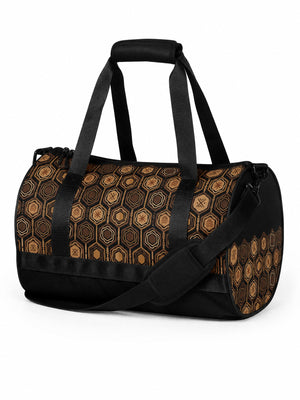 AnanseNova™ Gym Bag in Oji Black, bronze and gold hexagon print, three-quarter studio view
