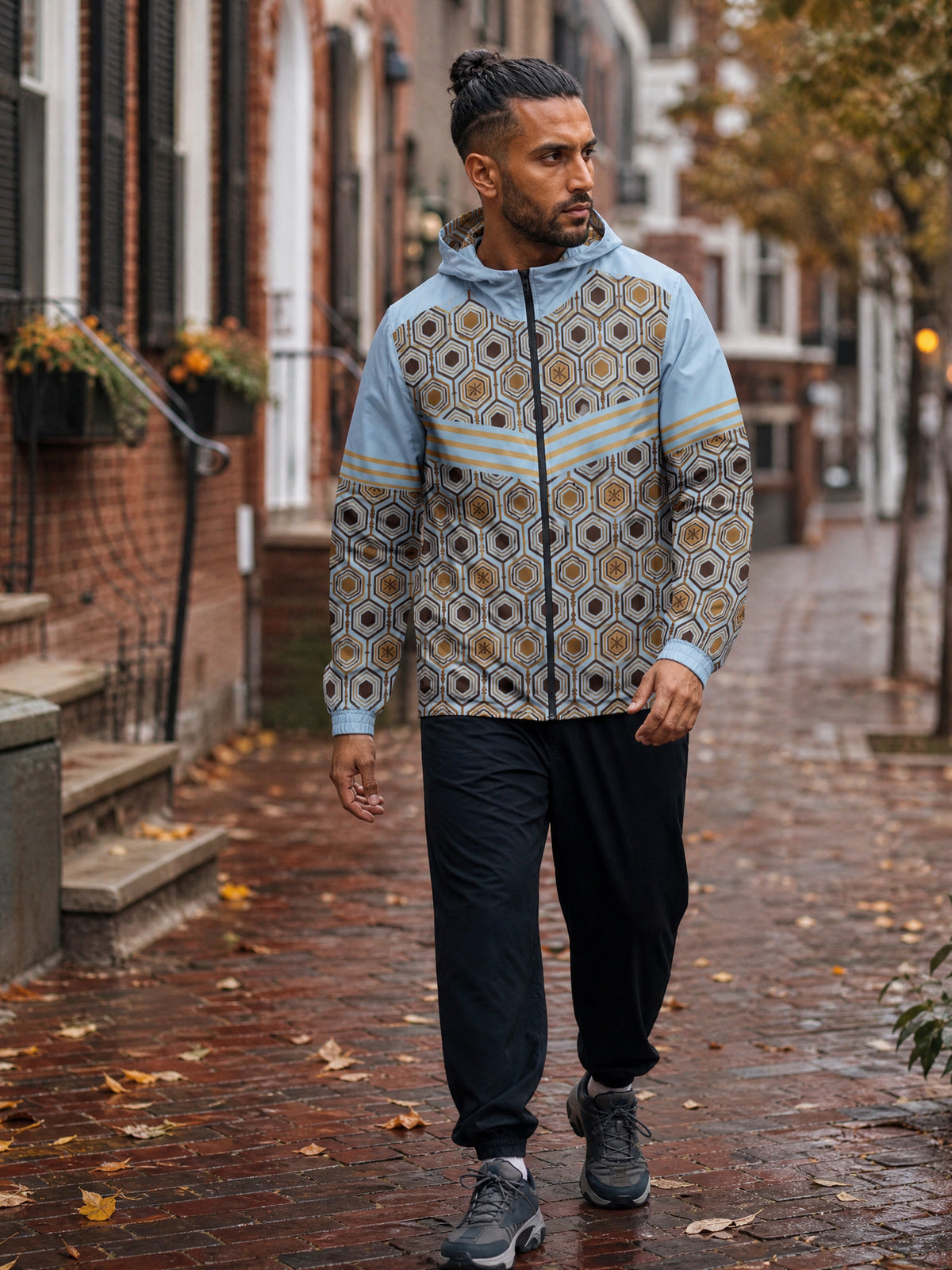 AnanseNova™ Men's Windbreaker in Igwe Blue — worn on a Philadelphia rowhouse street, autumn street style