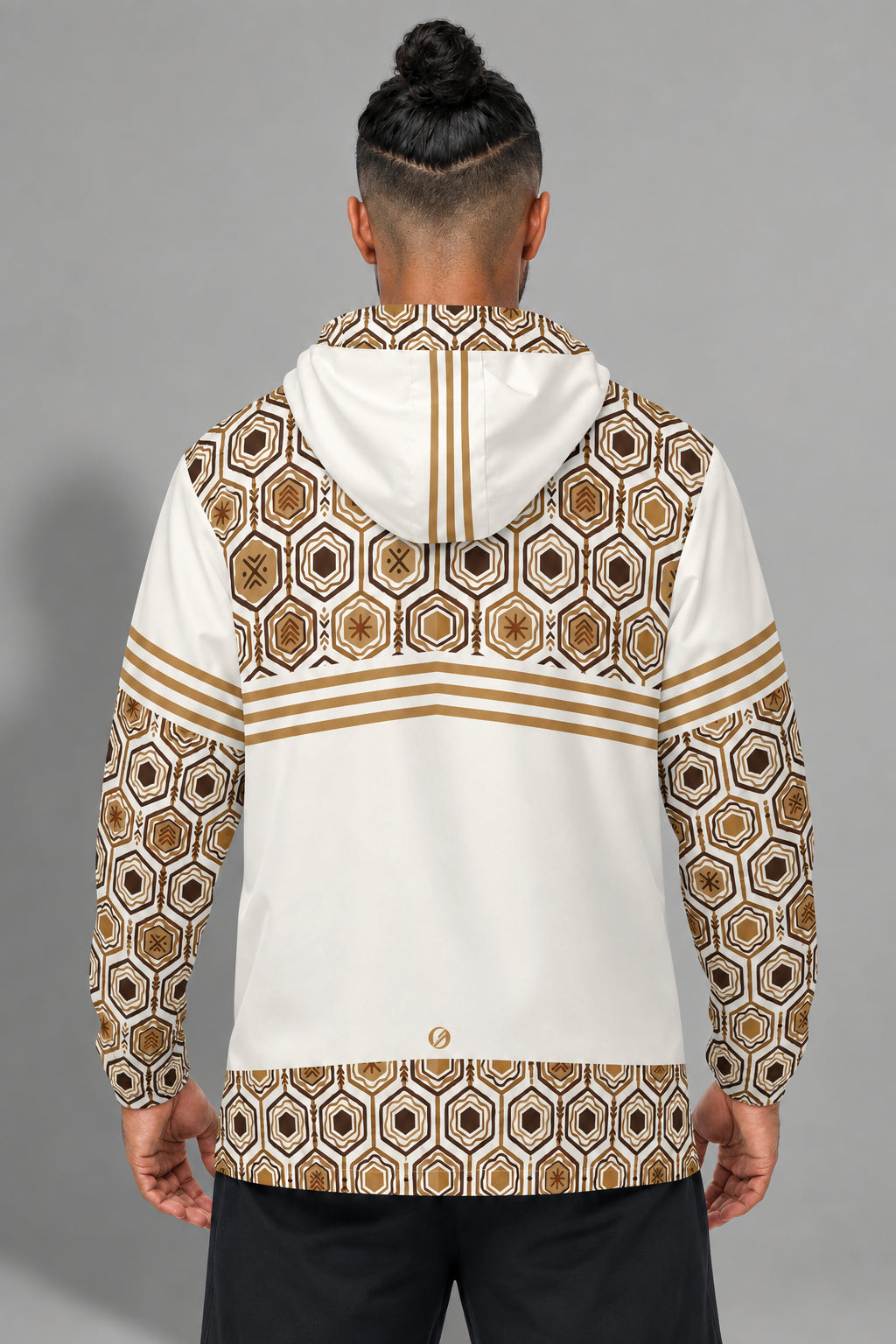 AnanseNova™ Men's Windbreaker in Ocha White — back view on model, hexagon yoke, triple stripe, solid back panel, SunBorn mark and hexagon hem