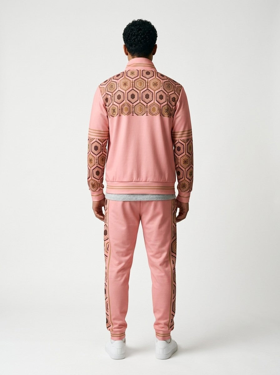 AnanseNova™ Track Jacket + Joggers Set in Eze Pink, back view on model showing the hexagon print yoke, printed sleeves and jogger side stripes