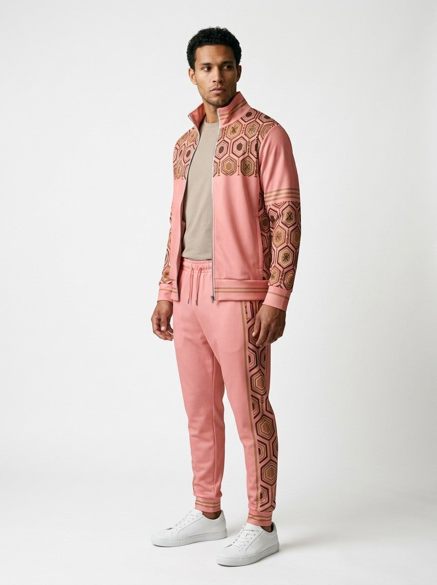 AnanseNova™ Track Jacket + Joggers Set in Eze Pink, three-quarter left view on model showing the printed sleeve and jogger side panel