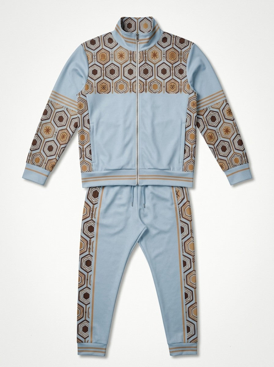 AnanseNova™ Track Jacket + Joggers Set in Igwe Blue laid out flat: full-zip track jacket above the matching joggers