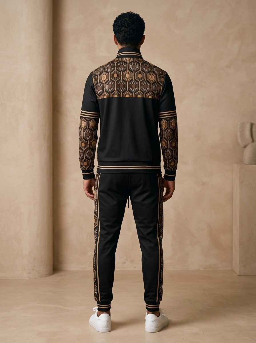 AnanseNova™ Track Jacket + Joggers Set in Oji Black, back view on model showing the hexagon print yoke, printed sleeves and jogger side stripes