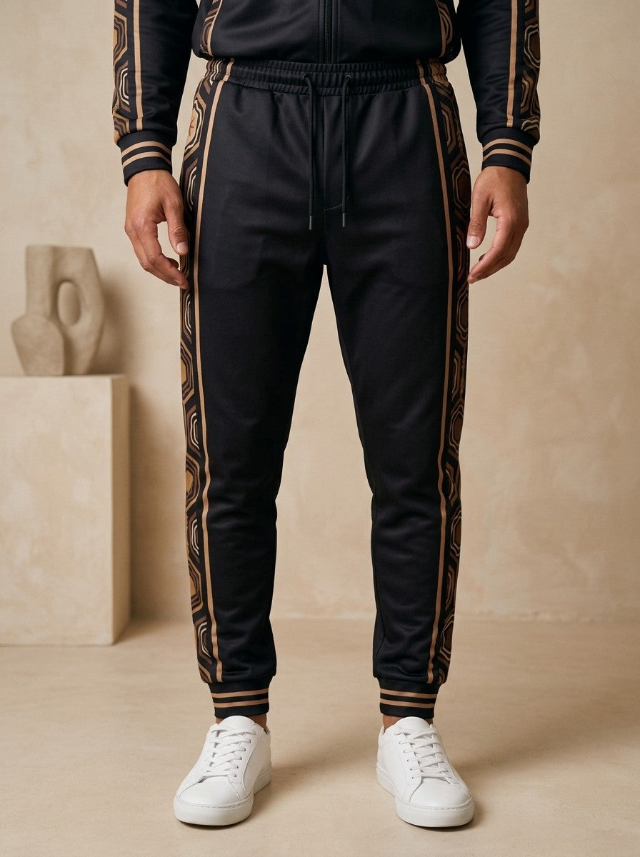 AnanseNova™ Joggers in Oji Black on model, waist to sneakers: drawcord waistband, tapered leg, striped cuffs and the hexagon side stripes