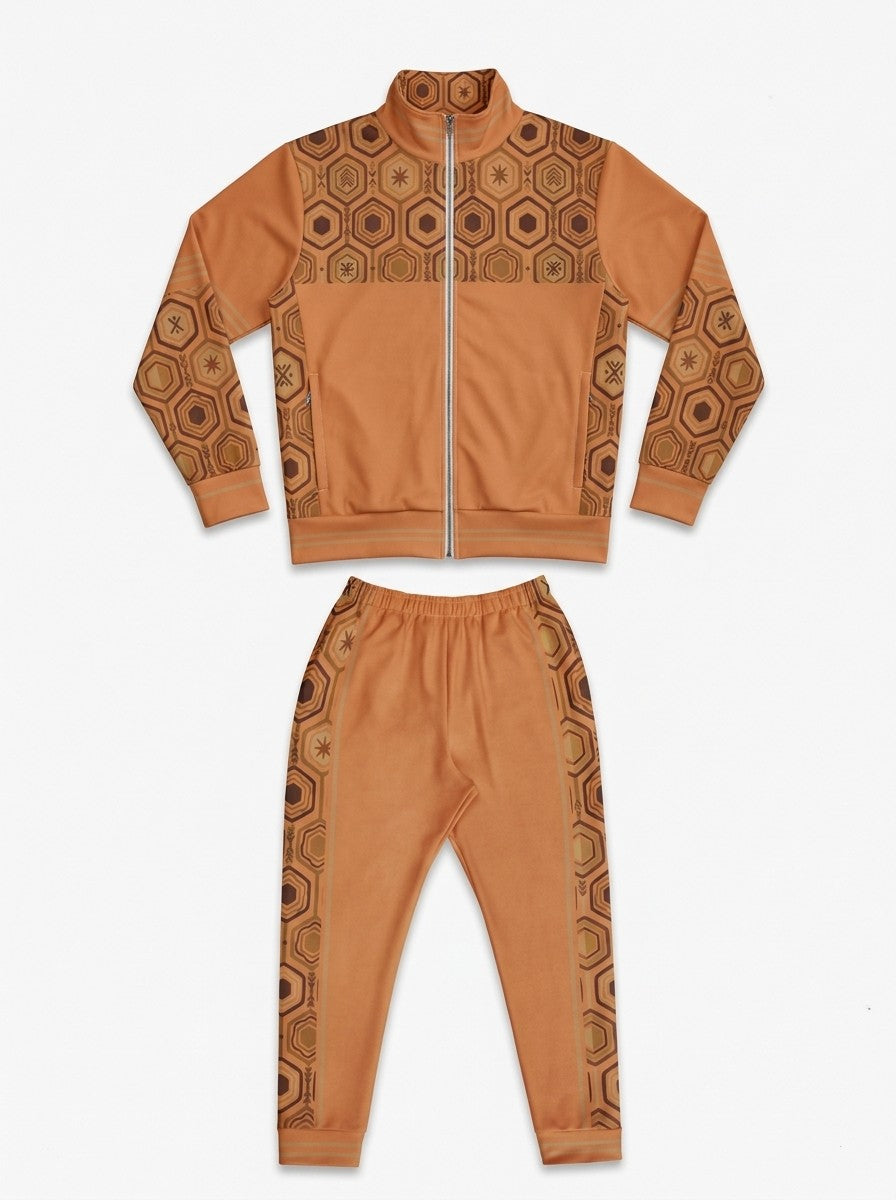 AnanseNova™ Track Jacket + Joggers Set in Sango Orange laid out flat: full-zip track jacket above the matching joggers