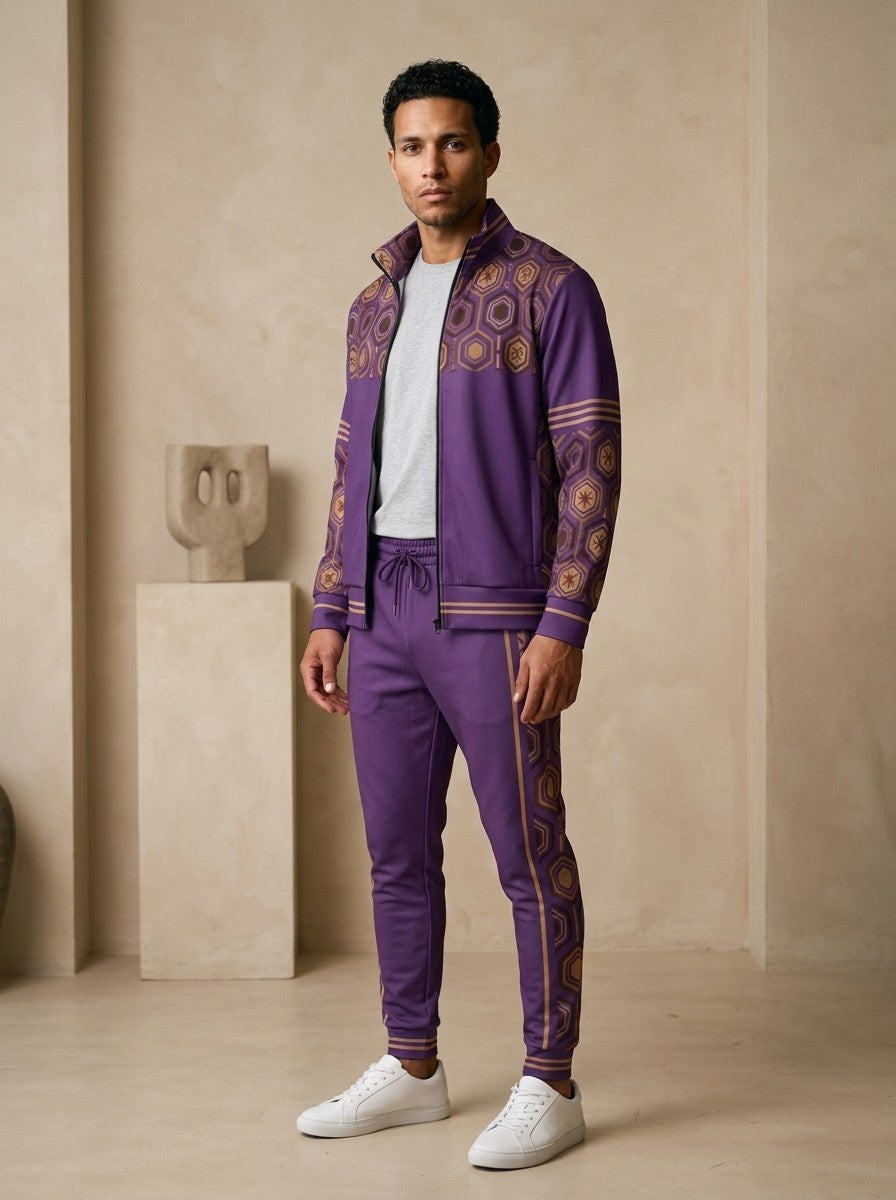 AnanseNova™ Track Jacket + Joggers Set in Ugo Purple, three-quarter left view on model showing the printed sleeve and jogger side panel
