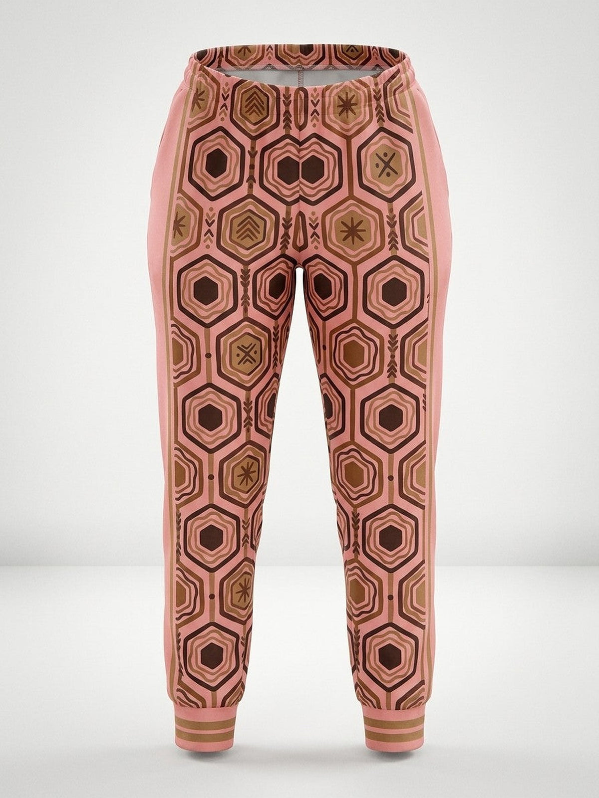 Ghost-mannequin front view of AnanseNova™ Women's Joggers in Adaeze Pink, AnanseNova™ hexagon print across both legs with bronze-striped rib cuffs