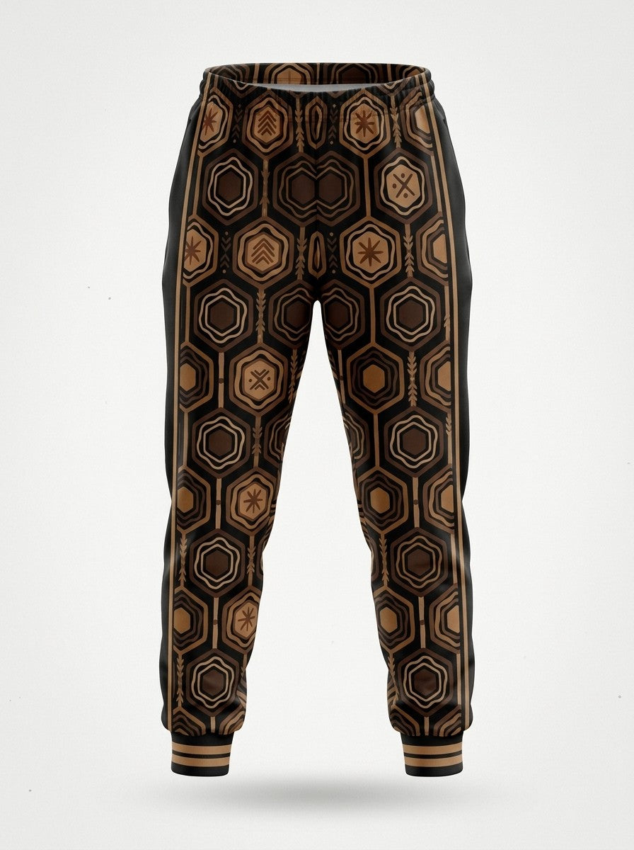 Ghost-mannequin front view of AnanseNova™ Women's Joggers in Oji Black, AnanseNova™ hexagon print across both legs with bronze-striped rib cuffs