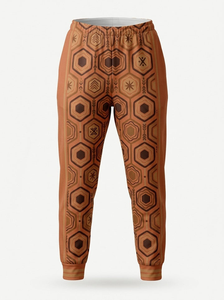 Ghost-mannequin front view of AnanseNova™ Women's Joggers in Sango Orange, AnanseNova™ hexagon print across both legs with bronze-striped rib cuffs