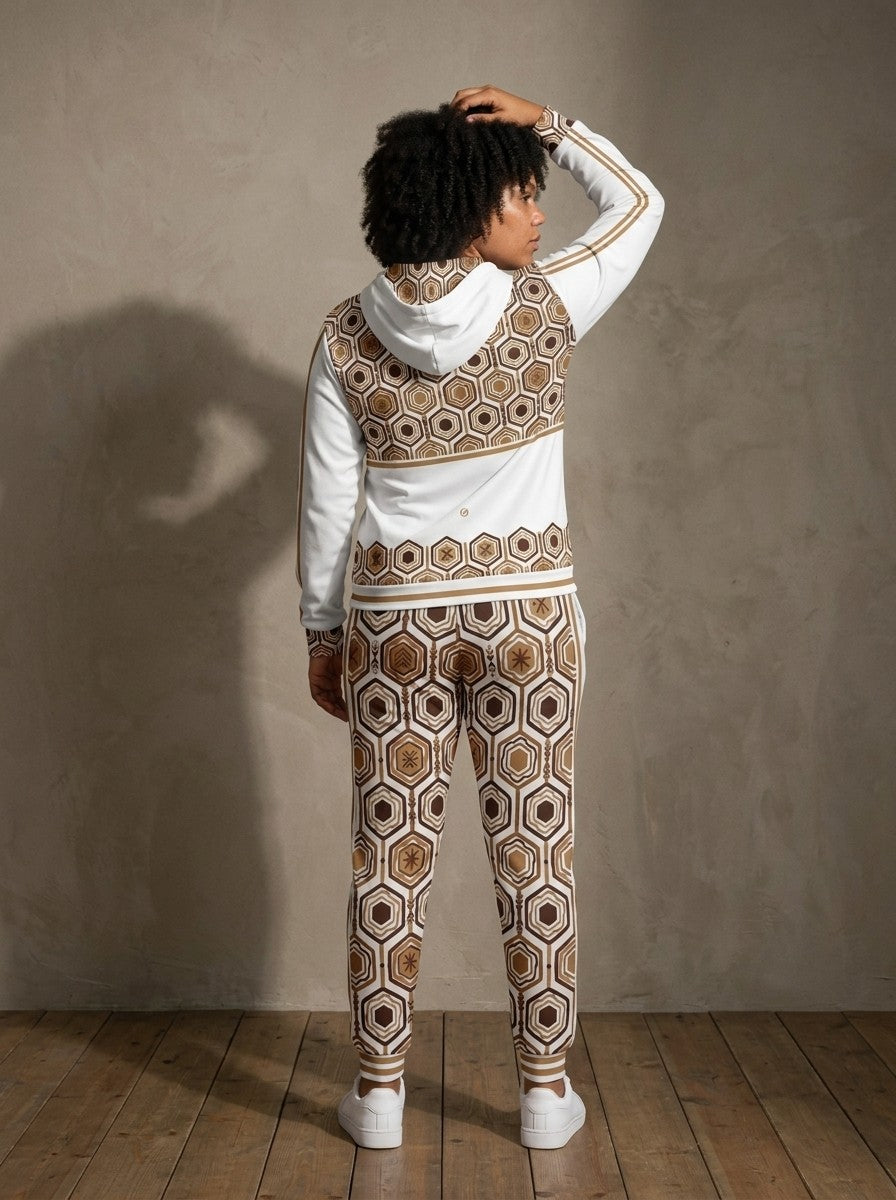 Back view of the AnanseNova™ women's Zip Hoodie + Joggers set in Ocha White on model, hexagon back yoke, bronze sleeve stripes and printed joggers | SunBorn