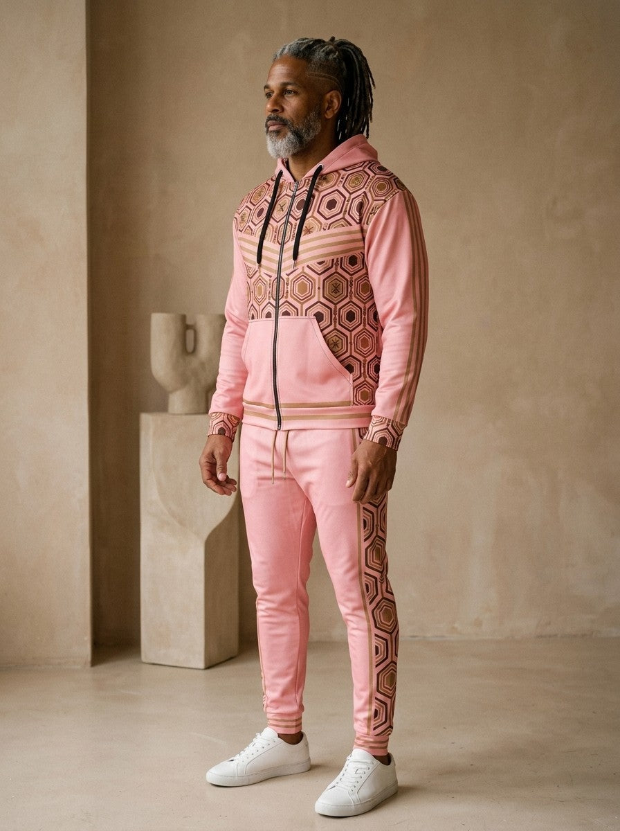 AnanseNova™ Zip Hoodie + Joggers Set in Eze Pink, three-quarter view on model showing the sleeve stripes and jogger side panel