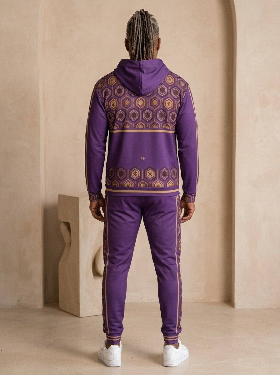 AnanseNova™ Zip Hoodie + Joggers Set in Ugo Purple, back view on model showing the hexagon print yoke and hem band and the joggers' side stripes