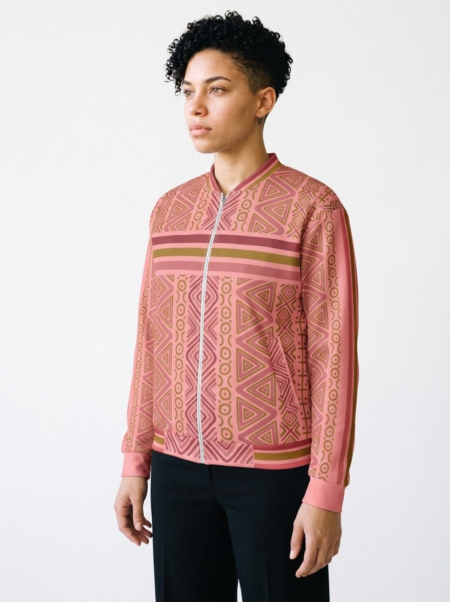 SunBorn N'Donso™ Bomber Jacket in Eze Pink, three-quarter left view on model with black trousers