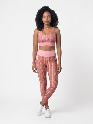 Front view of the N'Donso™ Bra + Pocket Leggings Set in Adaeze Pink: Hunter's Road print longline sports bra and high-rise pocket leggings by SunBorn