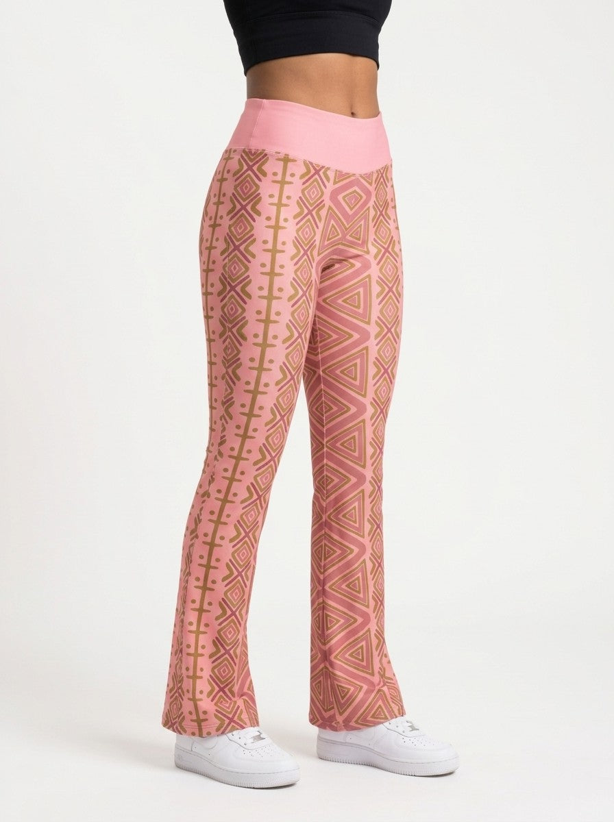 SunBorn N'Donso™ Flare Leggings in Adaeze Pink, three-quarter right view on model