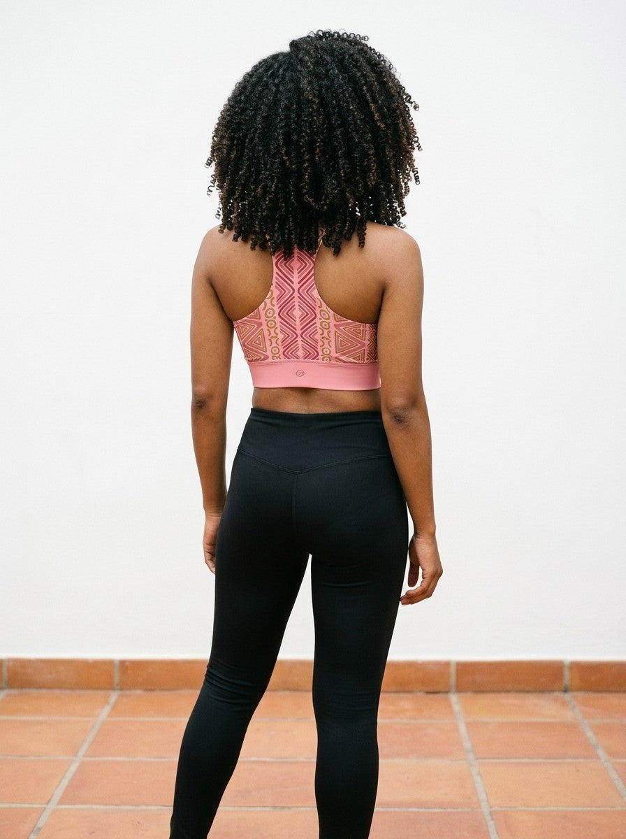 Back view of the SunBorn N'Donso™ Longline Bra in Adaeze Pink: racerback straps and SunBorn mark on the underband