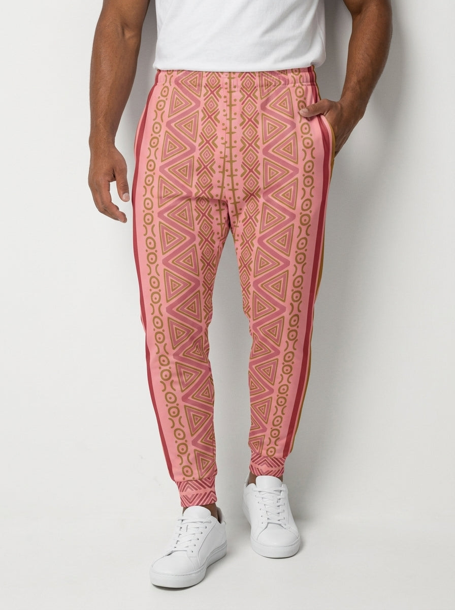 Man wearing SunBorn N'Donso™ Men's Joggers in Eze Pink, front view: Hunter's Road print waist to cuff with a solid side stripe