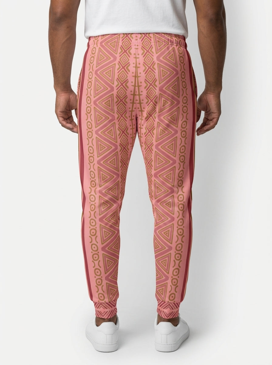 Back view of SunBorn N'Donso™ Men's Joggers in Eze Pink on model, with the print running down both legs