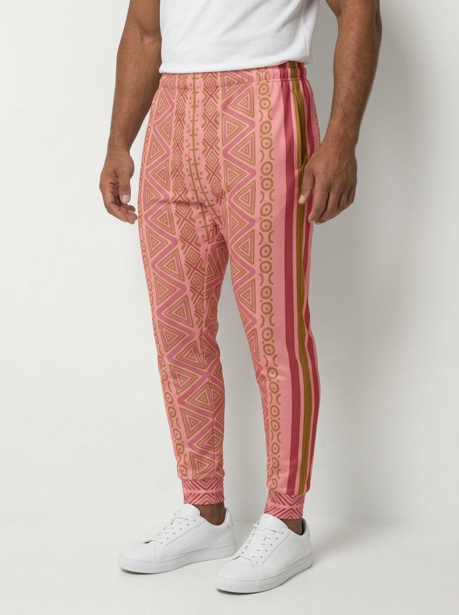 SunBorn N'Donso™ Men's Joggers in Eze Pink, three-quarter left view showing the striped side seam