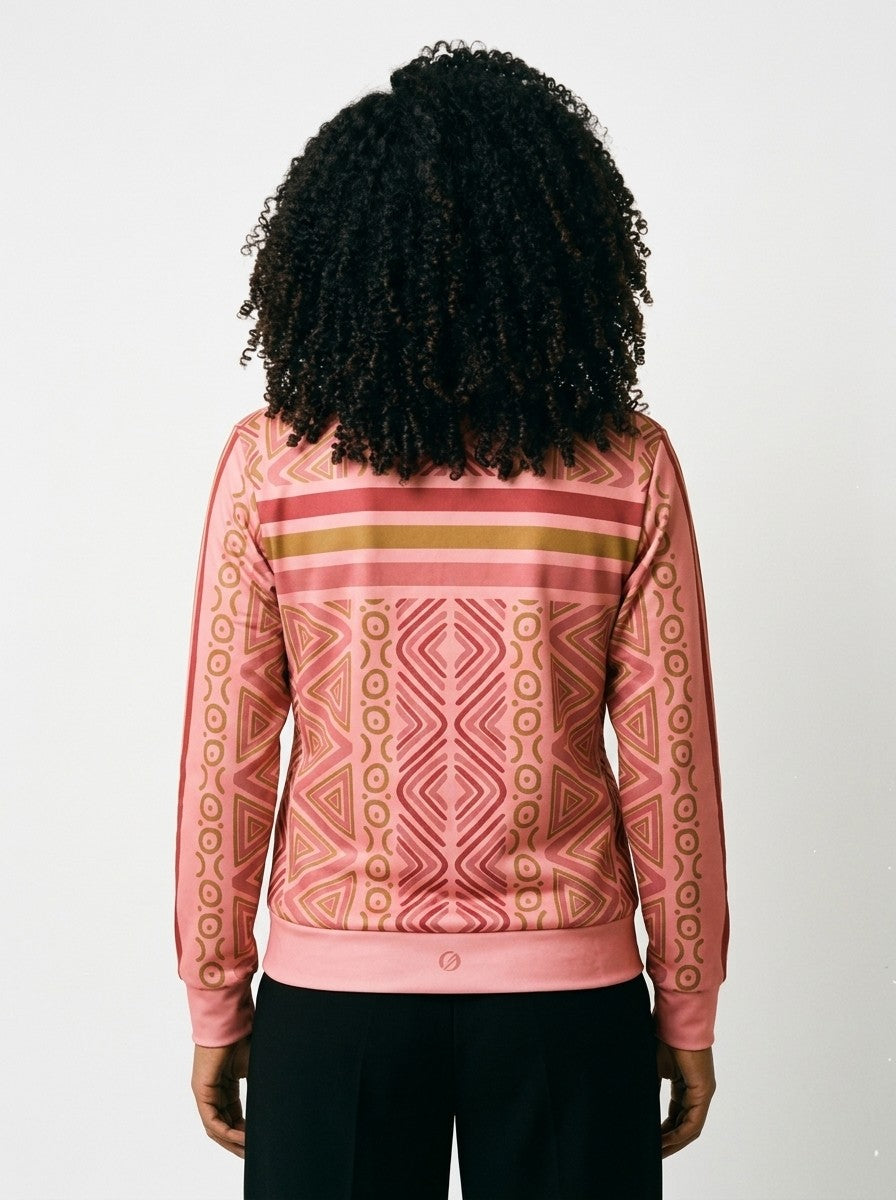Back view of the SunBorn N'Donso™ Track Jacket in Eze Pink on model: three-stripe yoke band and all-over Hunter's Road print