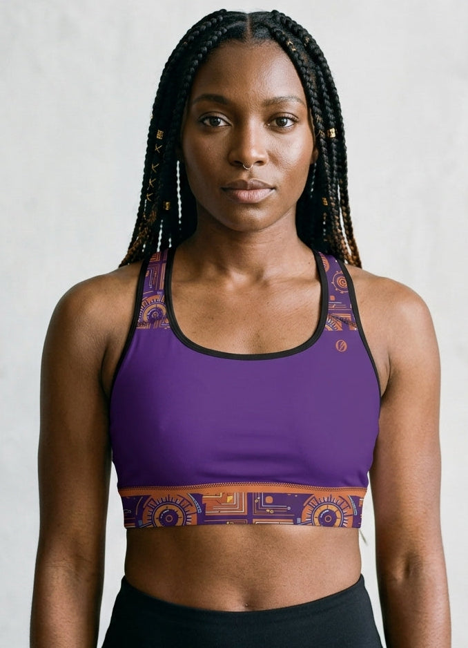 Sankofa Padded Sports Bra in the purple, burnt orange and cyan Kinetic Engine print, studio front view — SunBorn