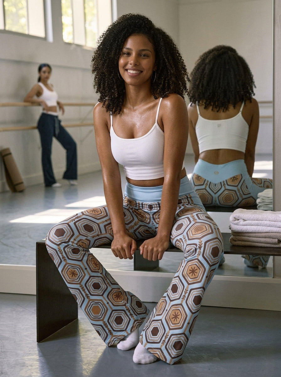 AnanseNova™ Flare Leggings in Igwe Blue™, lifestyle candid shot — SunBorn