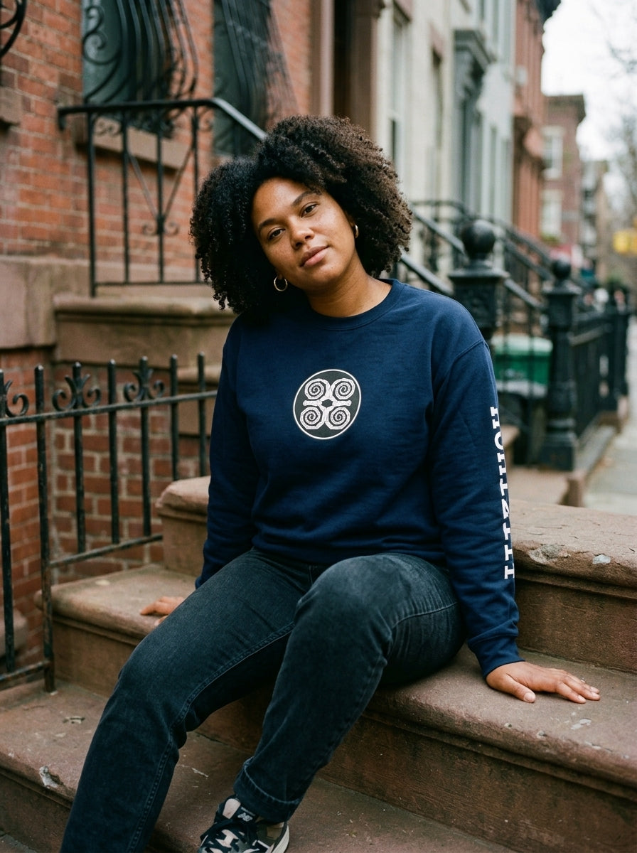 SunBorn Adinkra // Humility Sweatshirt in Anụnụ Blue, on-model fit check styled in a real-world lifestyle setting