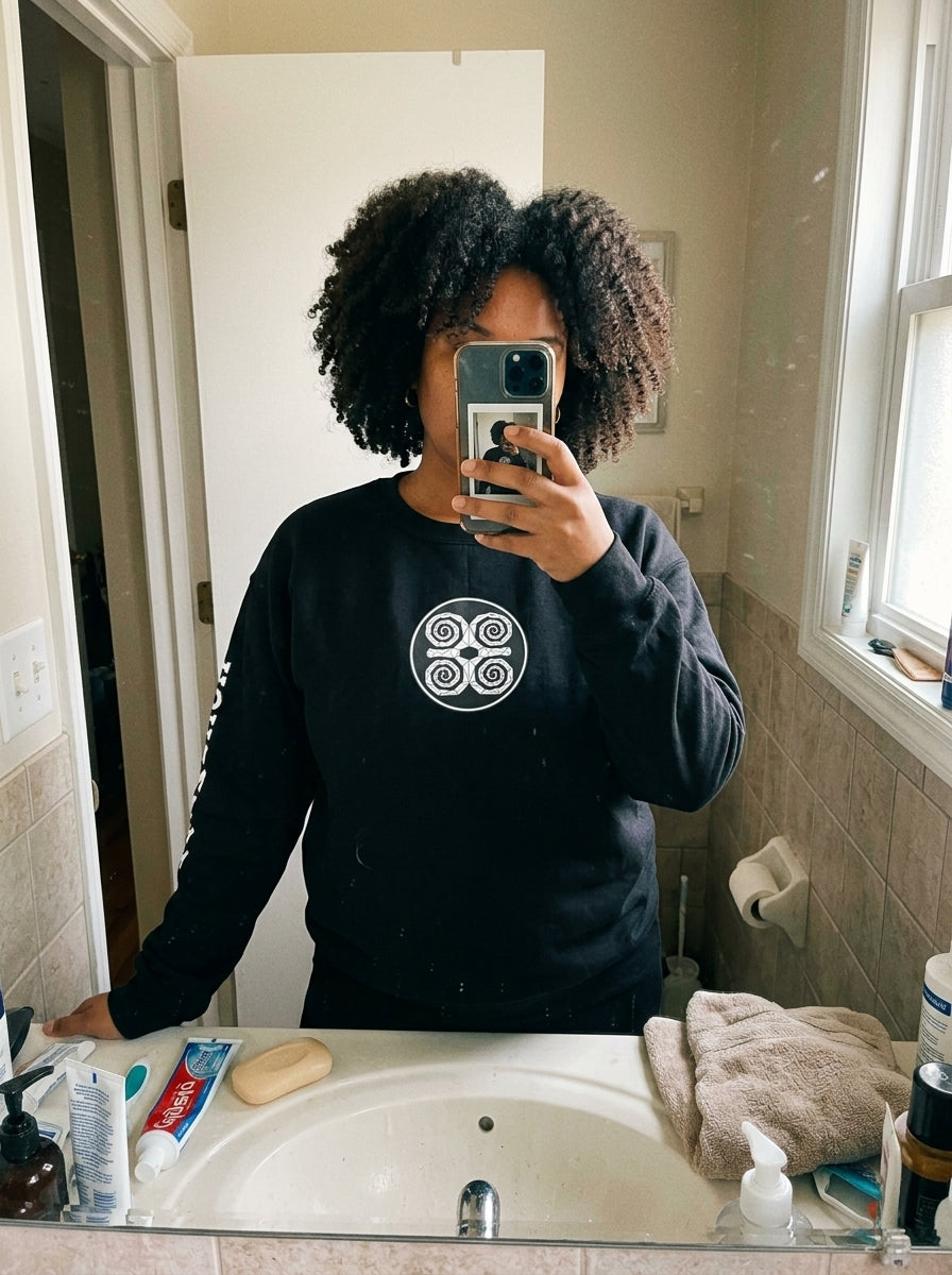 SunBorn Adinkra // Humility Sweatshirt in Oji Black, customer review styled shot