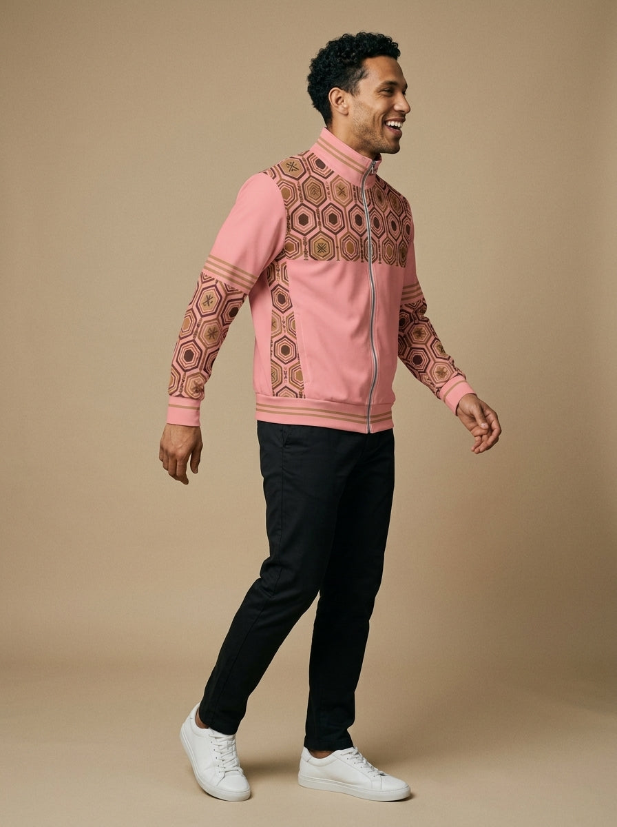AnanseNova™ Statement Track Jacket in Eze Pink — three-quarter right view on model, full-zip track jacket with hexagon yoke and forearm panels