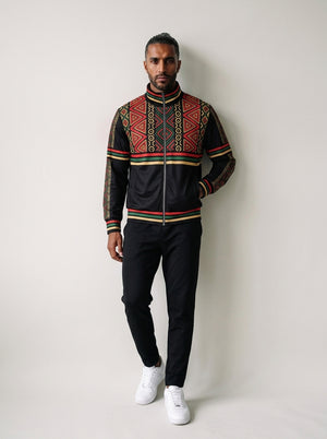 N'Donso™ Track Jacket in Uhie Red, front view — red Hunter's Road print on the shoulders and chest with a three-stripe band, full-length sleeve stripes, and a solid black collar, cuffs and hem over a full-zip front.