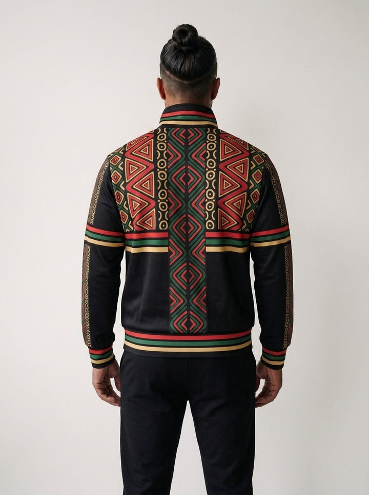 N'Donso™ Track Jacket in Uhie Red, back view — Hunter's Road print across the upper back with a three-stripe band and full-length sleeve stripes.