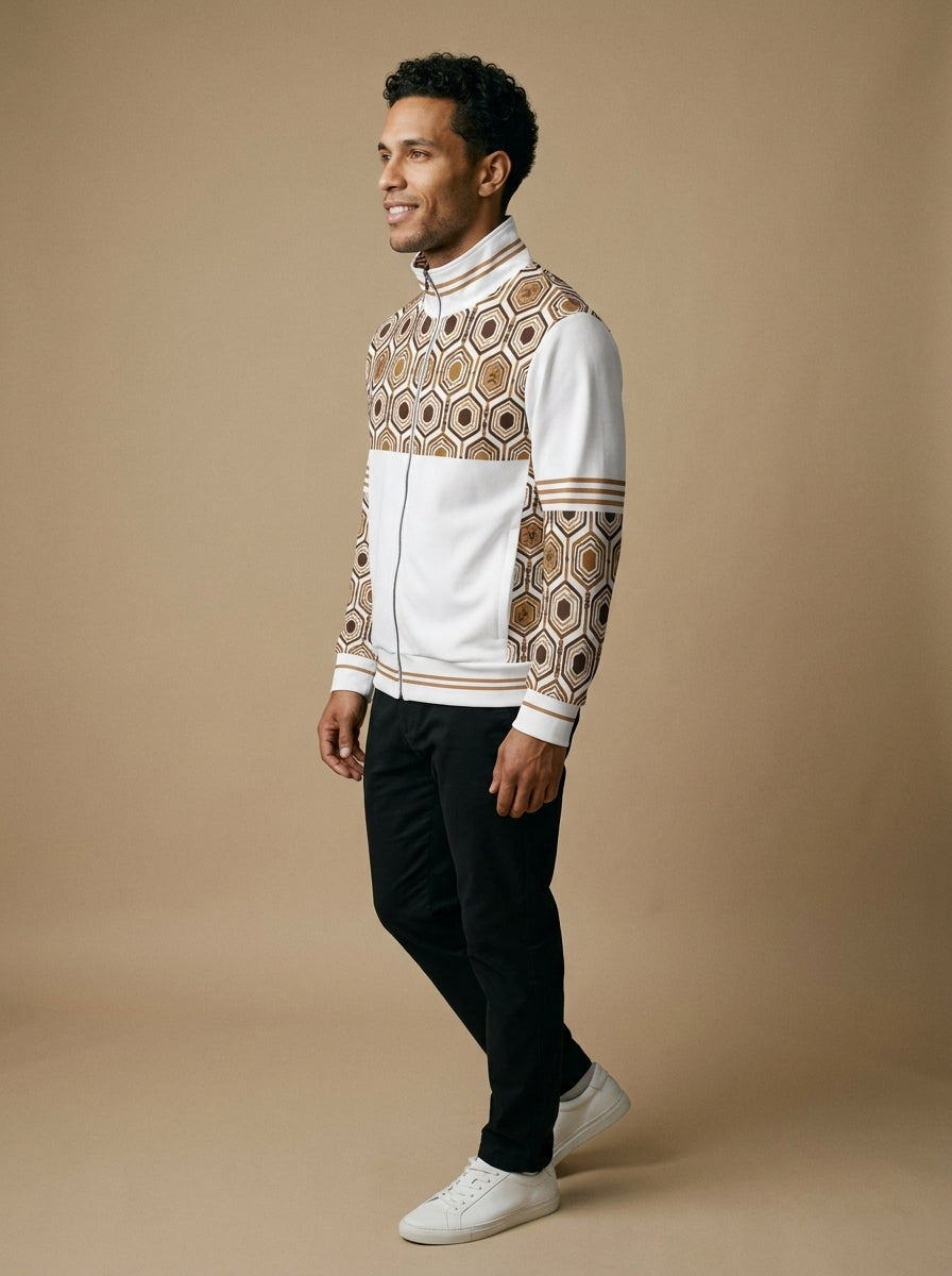 AnanseNova™ Statement Track Jacket in Ocha White — three-quarter left view on model, full-zip track jacket with hexagon yoke and forearm panels