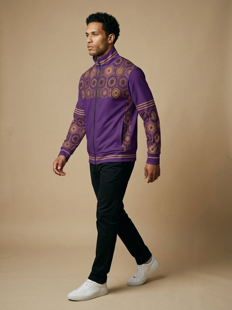 AnanseNova™ Statement Track Jacket in Ugo Purple — three-quarter left view on model, full-zip track jacket with hexagon yoke and forearm panels