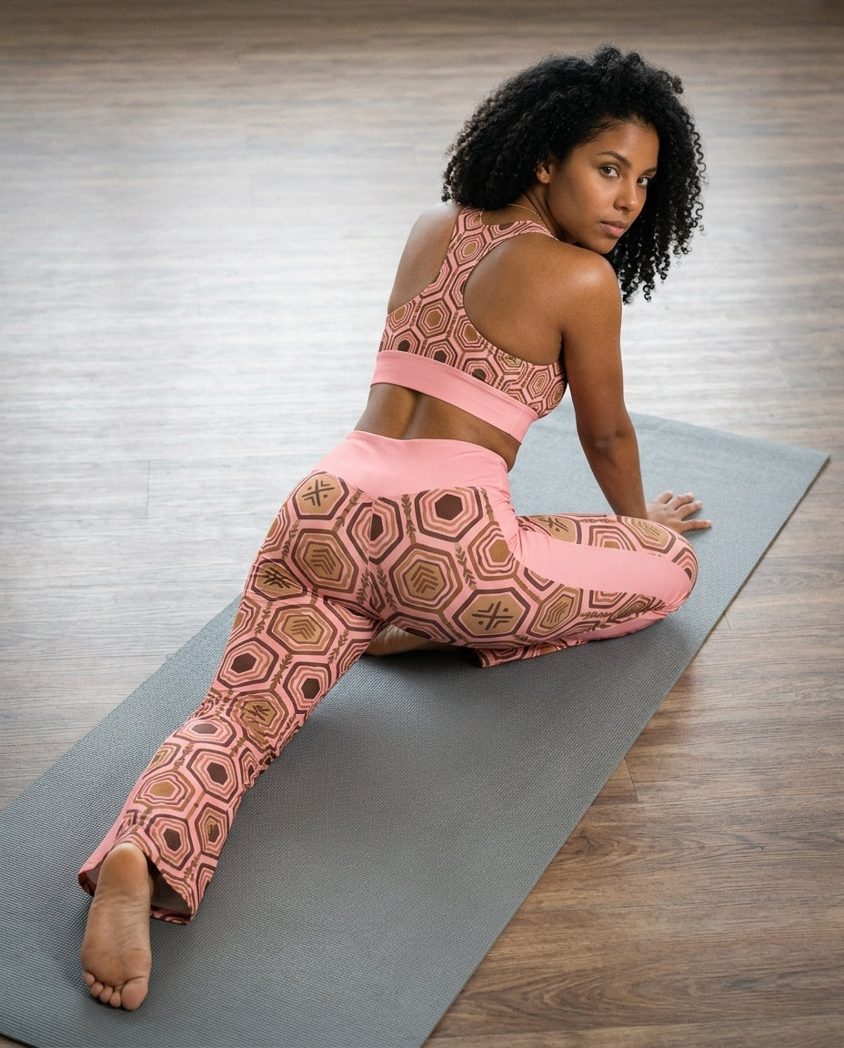 Rear view of the Adaeze Pink AnanseNova™ Flare Leggings from the set — high-waisted, butt-lifting cut in hexagon print