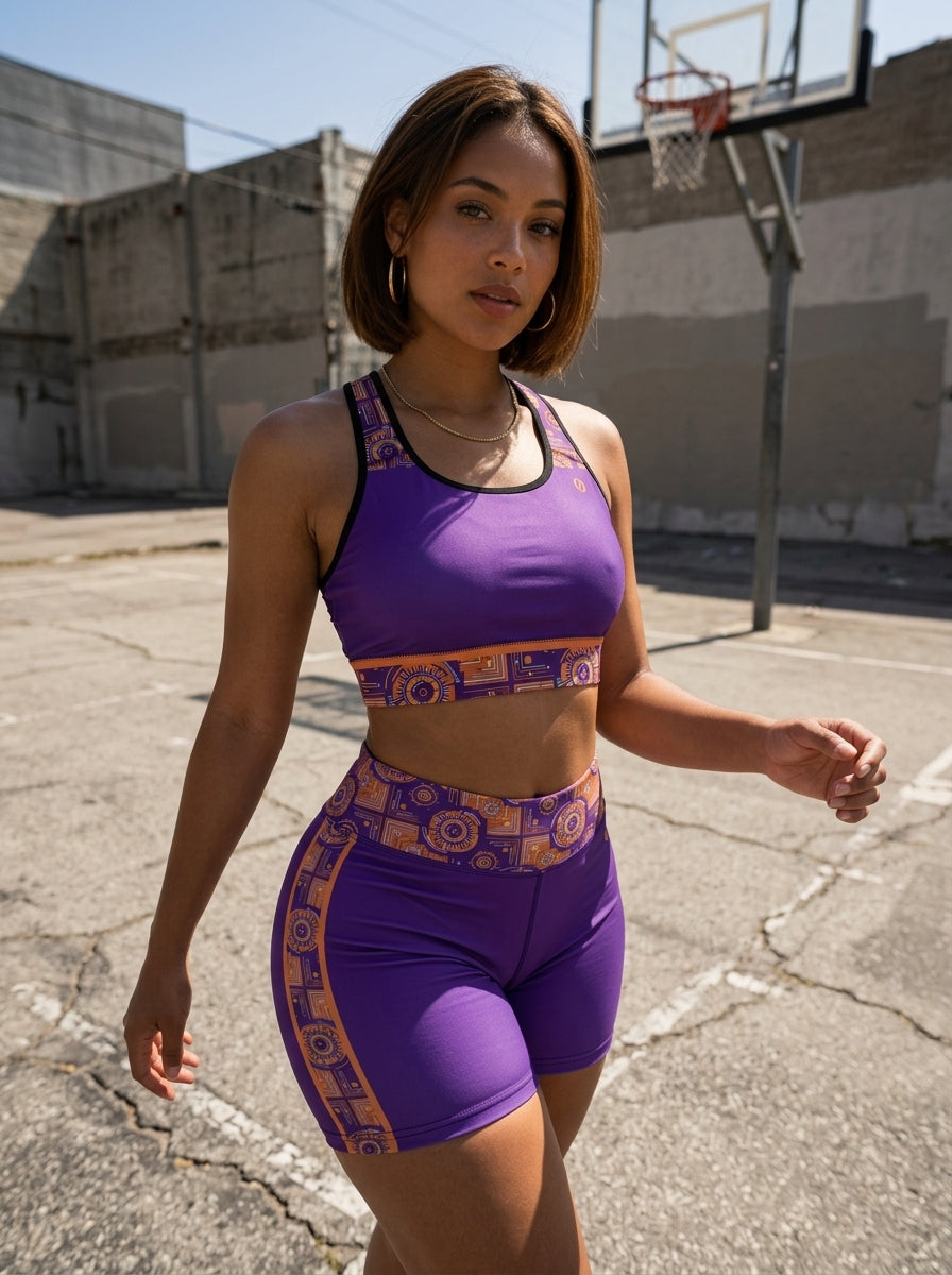 Sankofa padded sports bra and yoga shorts set — studio front view — Royal Purple gear-and-circuit compression — SunBorn