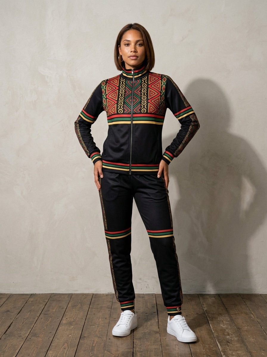 N'Donso™ Women's Track Jacket + Joggers set in Uhie Red, worn full-length, front