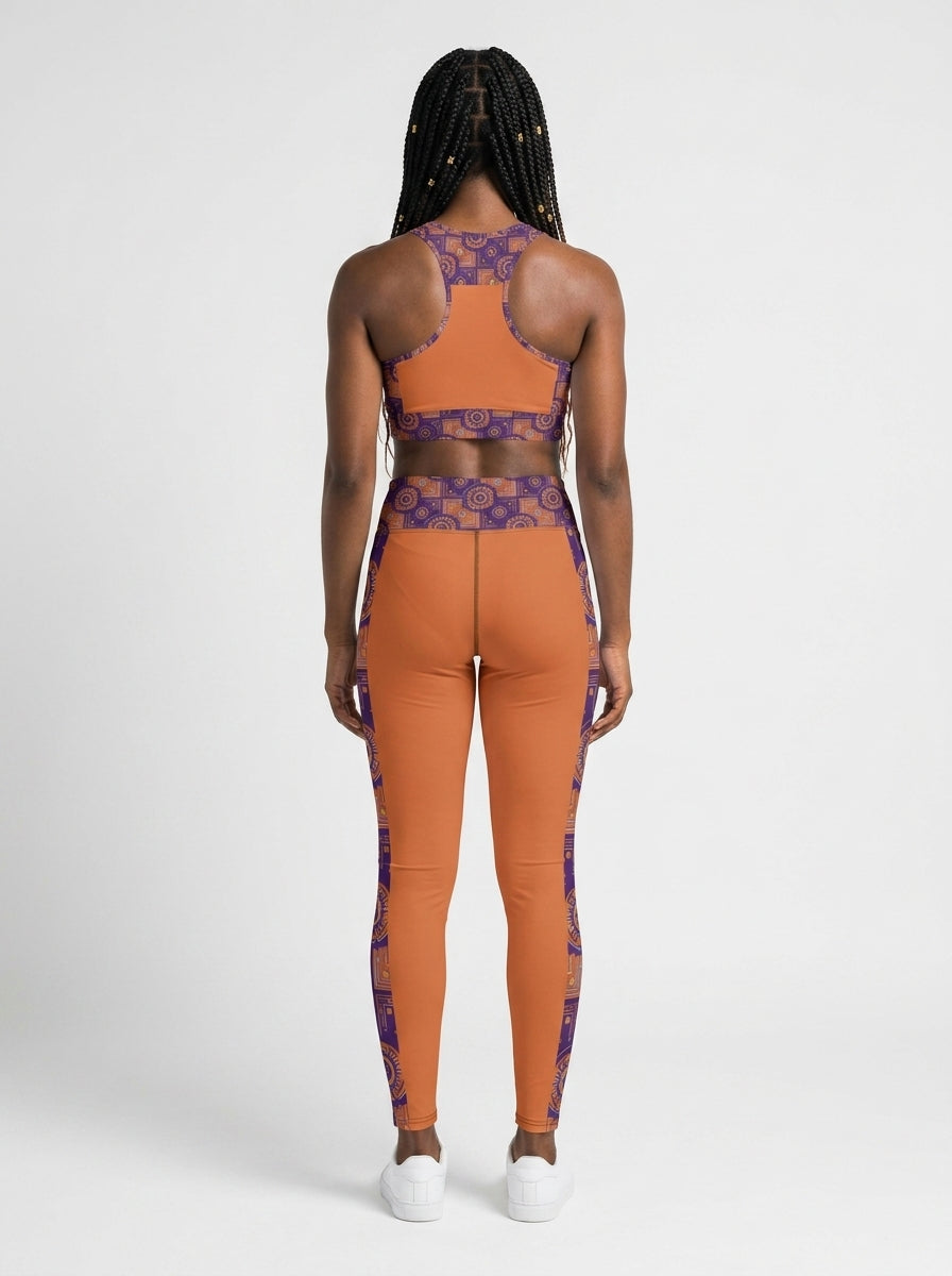 Sankofa Set // Bra + Leggings — Sango Orange colorway — studio back view — SunBorn