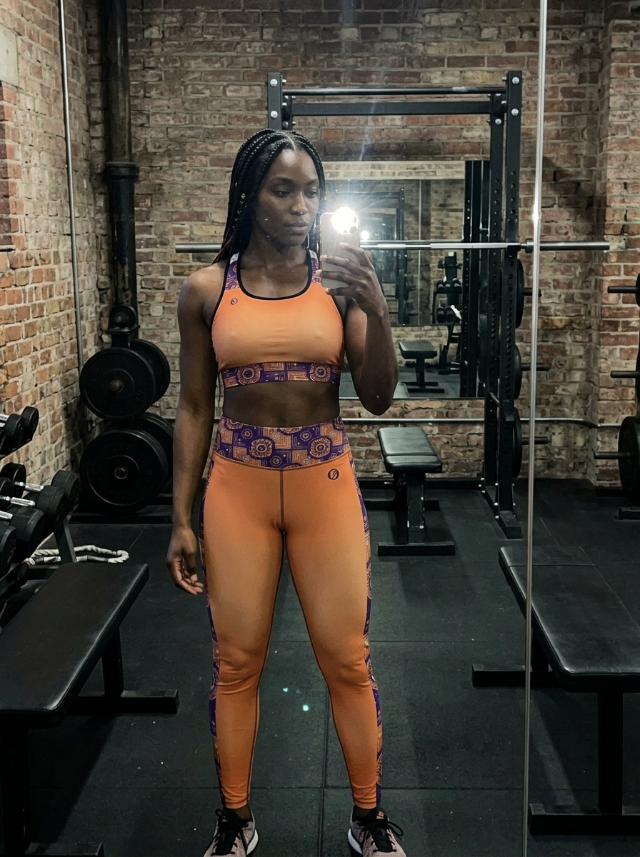 Sankofa Set // Bra + Leggings — Sango Orange colorway — UGC mirror selfie in gym locker room, real fit — SunBorn