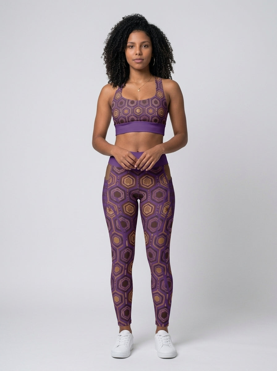 AnanseNova™ Set // Bra + Pocket Leggings in Ugo Purple — front view on model, hexagon-print longline sports bra and high-waisted side-pocket leggings
