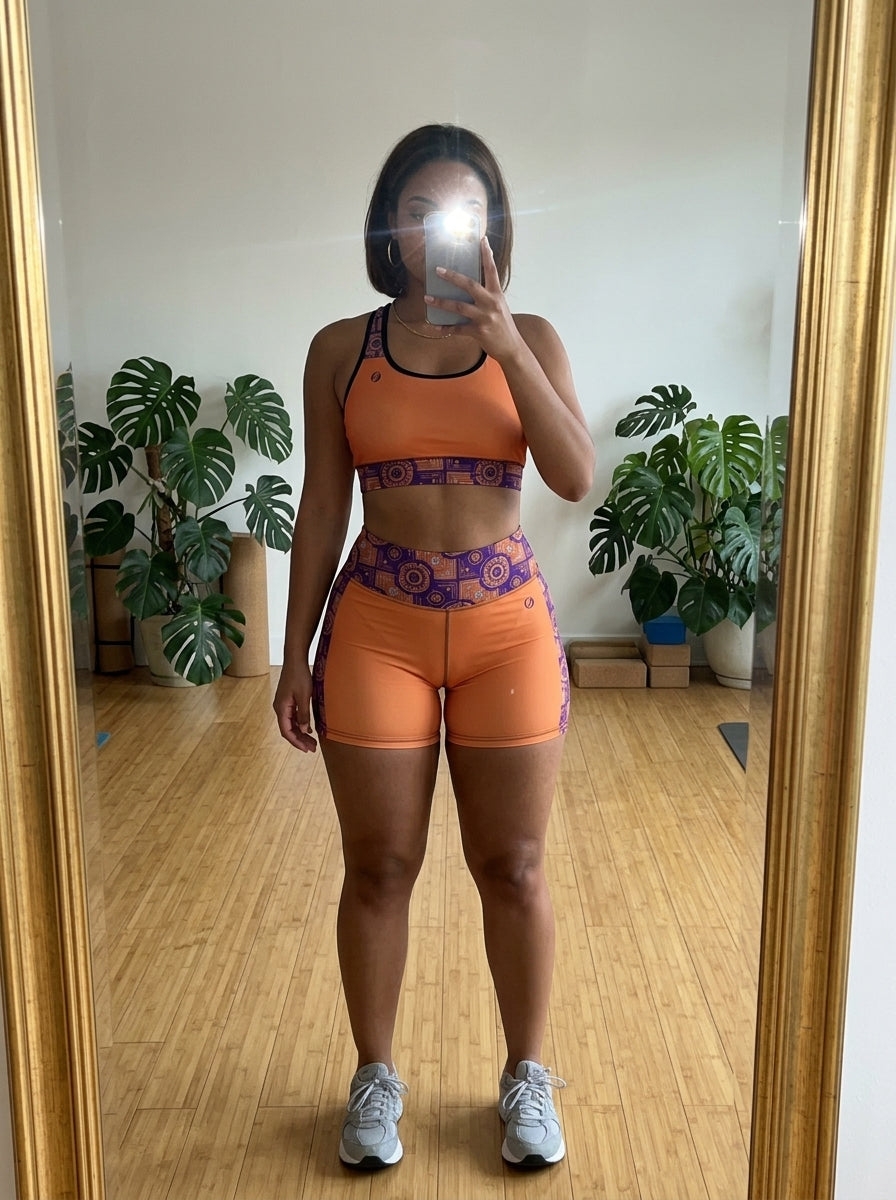 Sankofa Set // Bra + Shorts — Sango Orange colorway — UGC mirror selfie in gym locker room, real fit — SunBorn
