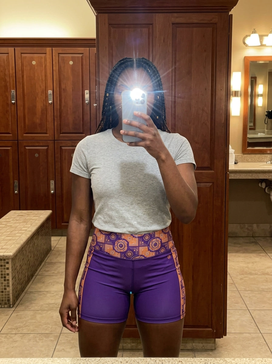 Sankofa Yoga Shorts in the Kinetic Engine print, UGC mirror selfie in gym locker room — SunBorn