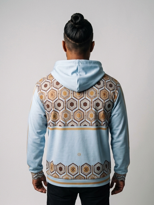 AnanseNova™ Zip Hoodie in Igwe Blue, back view — hexagon yoke panel and hexagon hem band