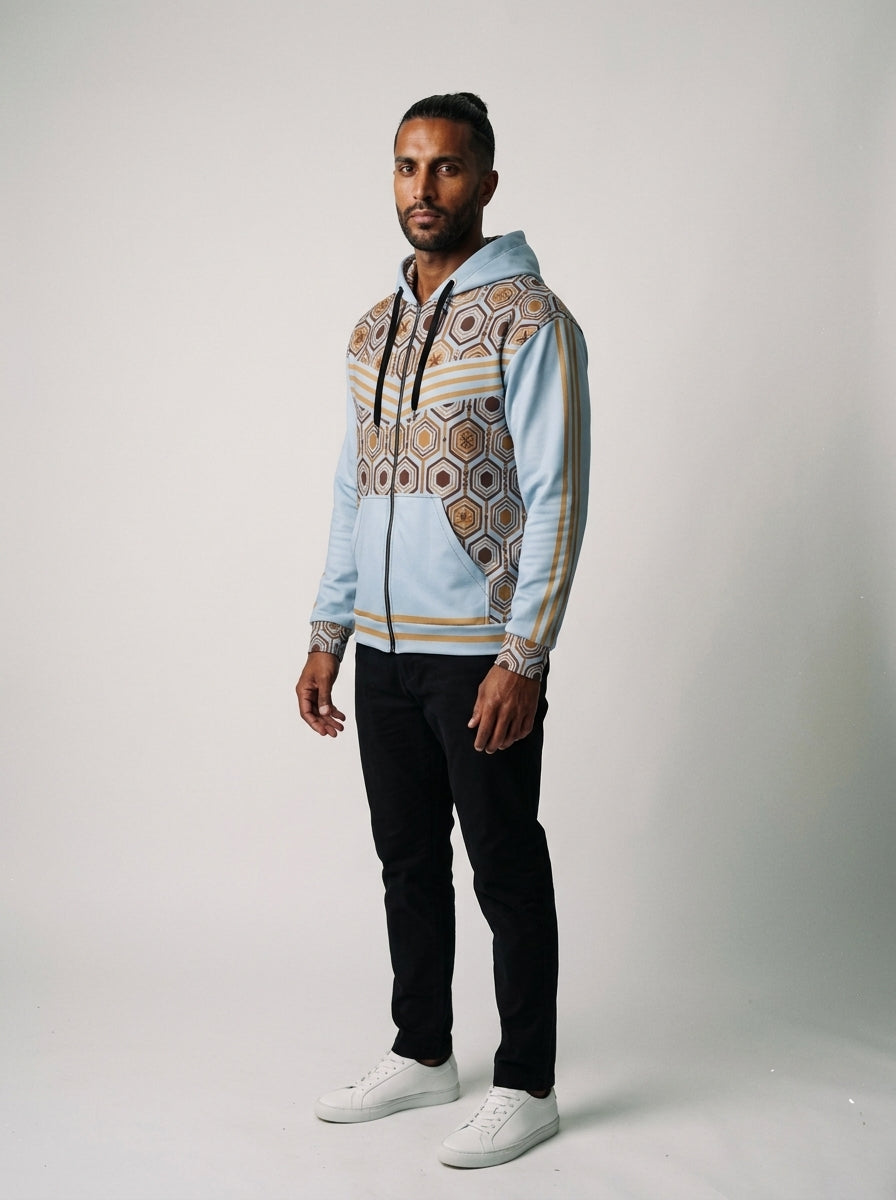 AnanseNova™ Zip Hoodie in Igwe Blue, three-quarter left view on model